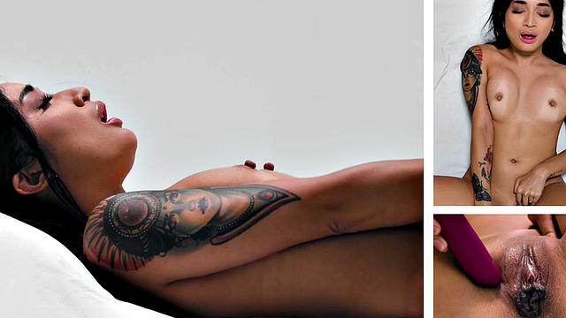 Inked babe solo fingering herself after interview