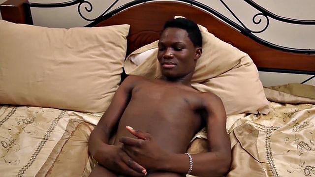 Amateur African twink jerks off in solo action at home