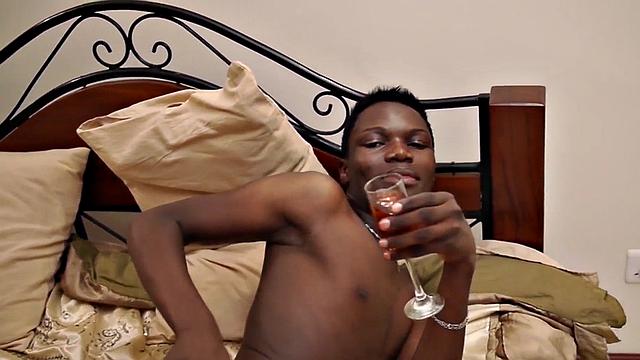 Amateur African twink jerks off in solo action at home