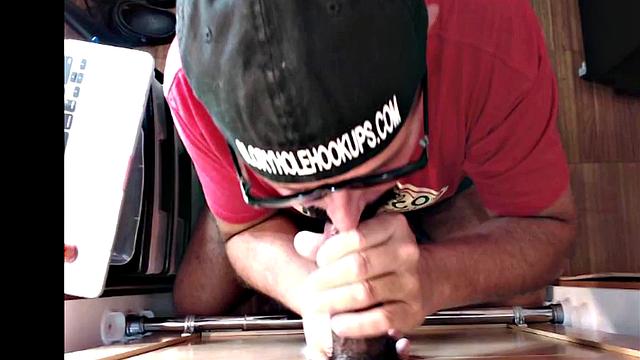 Gloryhole gay sucks big dick while stroking