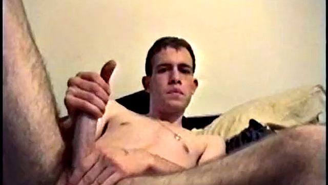 Putting his hairy ass and balls in our face, Nate gets himself hard, with a little help from some porn magazines. The young man kneels over his porn, and a box, with a pillow tucked between his legs.