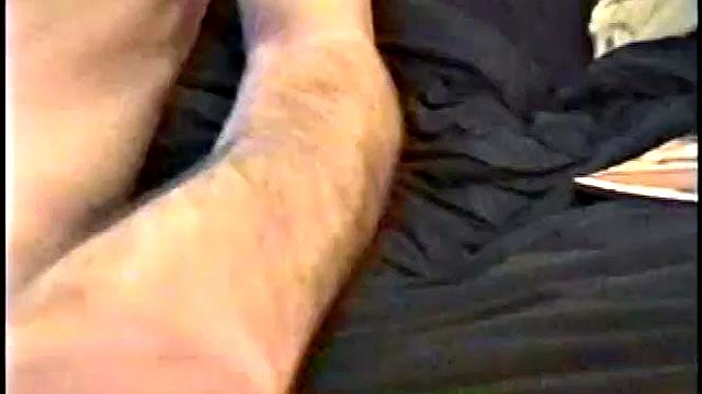 Putting his hairy ass and balls in our face, Nate gets himself hard, with a little help from some porn magazines. The young man kneels over his porn, and a box, with a pillow tucked between his legs.