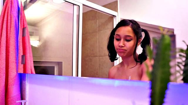 Hot Latina teen showers and shows tits