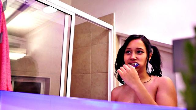 Hot Latina teen showers and shows tits