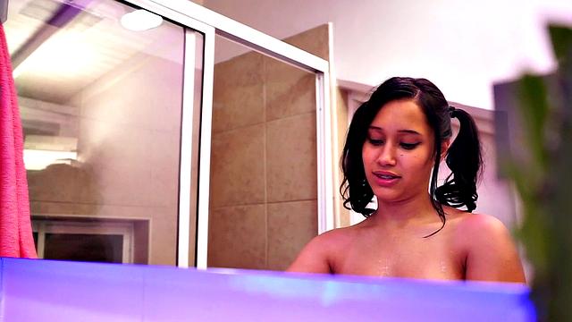 Hot Latina teen showers and shows tits