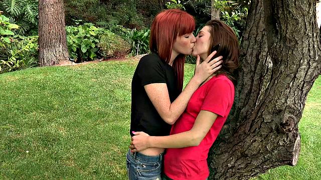 Redhead and bald pussy get wet and wild in an indoor threesome