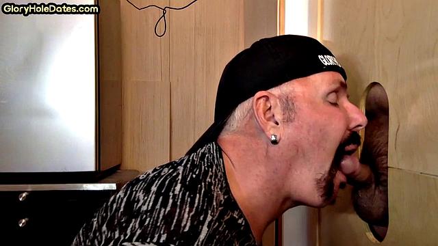 Gloryhole deepthroating DILF sucks lucky dudes cock