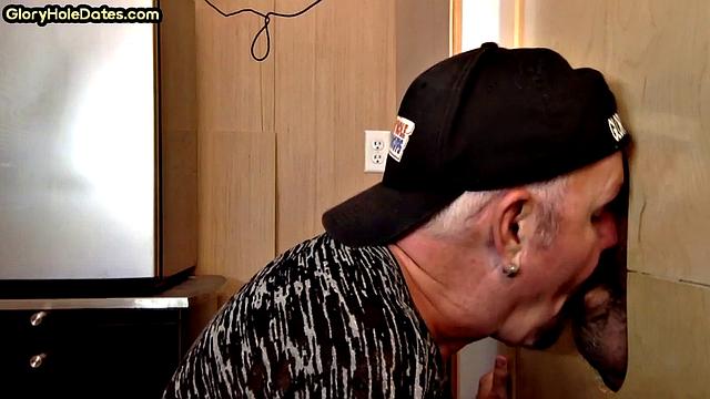 Gloryhole deepthroating DILF sucks lucky dudes cock