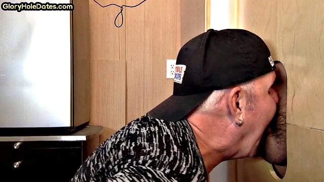 Gloryhole deepthroating DILF sucks lucky dudes cock