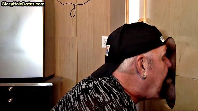 Gloryhole deepthroating DILF sucks lucky dudes cock