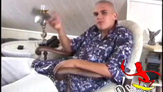 Bobby Golden's shaved head gives him a certain edginess that is only softened by his beach boy look. He works up a nice bulge before releasing his big cock.