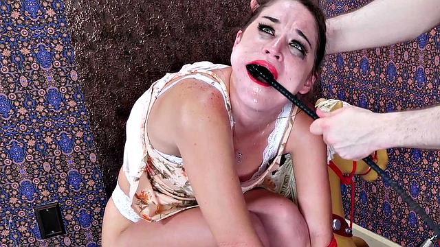 Gagging BDSM teen deep throating cock