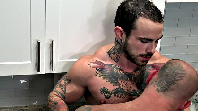 Ink MTF fucked by tattooed jock in kitchen after BJ