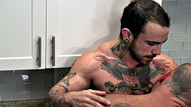 Ink MTF fucked by tattooed jock in kitchen after BJ