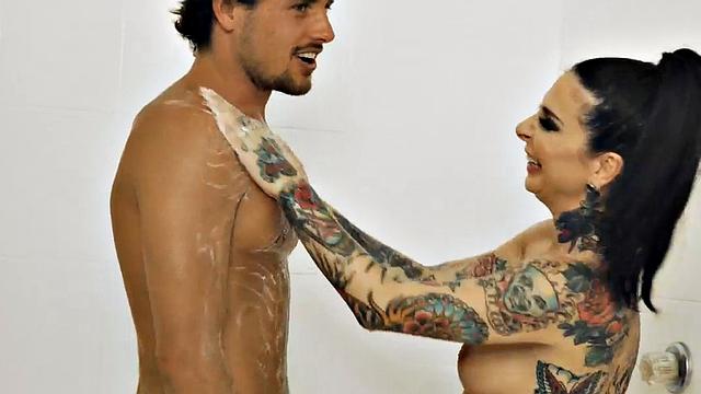 Perv inked masseuse throating client before doggy-style