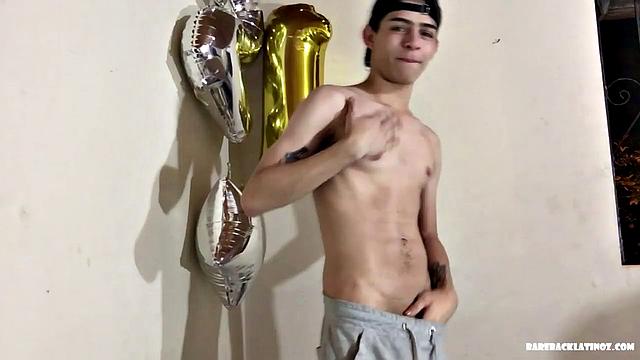 Our featured solo of the week is Latin boy Paul, a skinny and smooth twink, with a bit of the bad boy look going on. The young man stands, wearing only his shorts, which he reveals to release his cock.