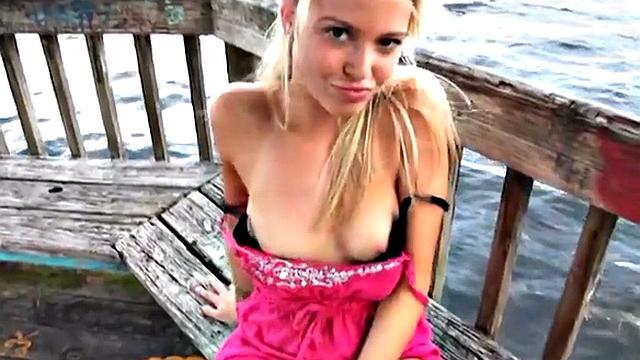 Public teen stripping off by the lake in POV
