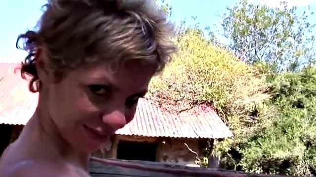 Busty MILF strips off her panties