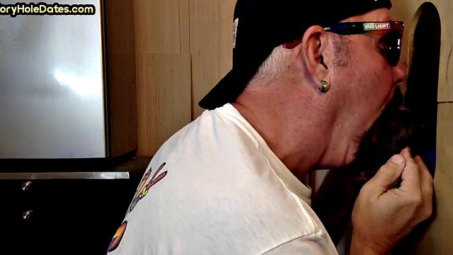 Gloryhole amateur gay sucks black penis at home