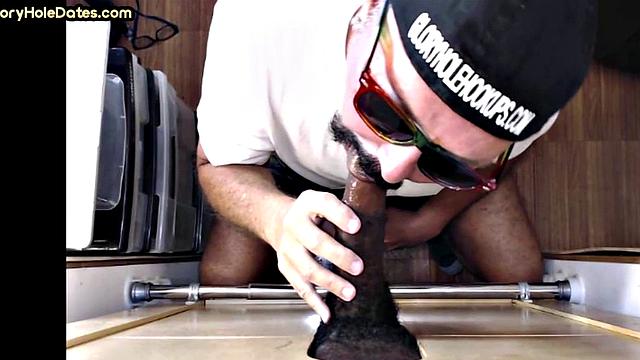 Gloryhole amateur gay sucks black penis at home