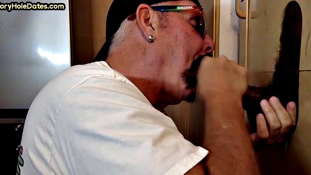 Gloryhole amateur gay sucks black penis at home