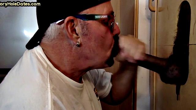 Gloryhole amateur gay sucks black penis at home