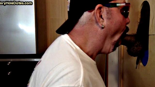 Gloryhole amateur gay sucks black penis at home