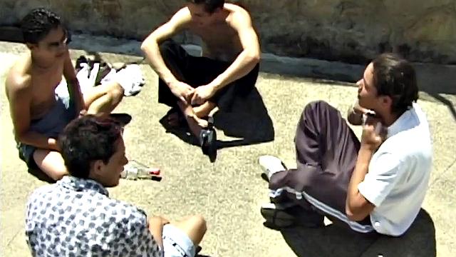 In the first of a two part series, we lpok in on young Latinos playing a game of spin the bottle by the pool. The rule is the loser has to remove an item of clothing.