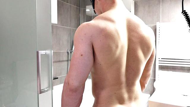 Muscled stud with mask masturbates and cums in solo action