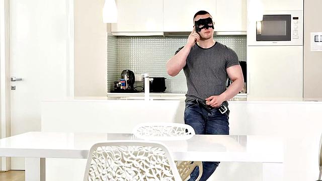 Muscled stud with mask masturbates and cums in solo action