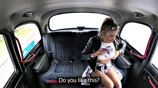 Blonde teen rubs her pussy while driving in reverse with glasses on & food in her mouth