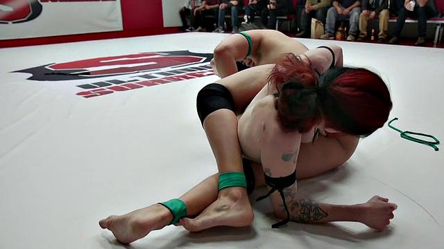 Group of lez wrestlers fight in public wrestling round