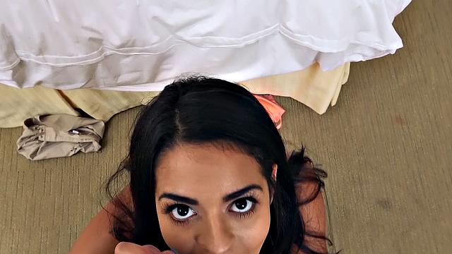 Watch this athletic Latina tease and give a hot handjob in the bedroom