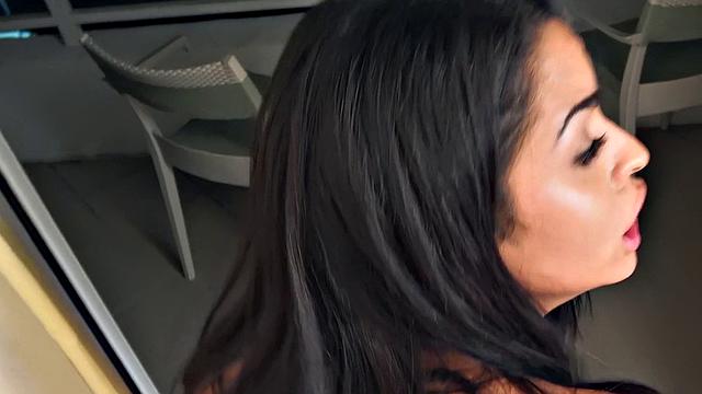 Watch this athletic Latina tease and give a hot handjob in the bedroom