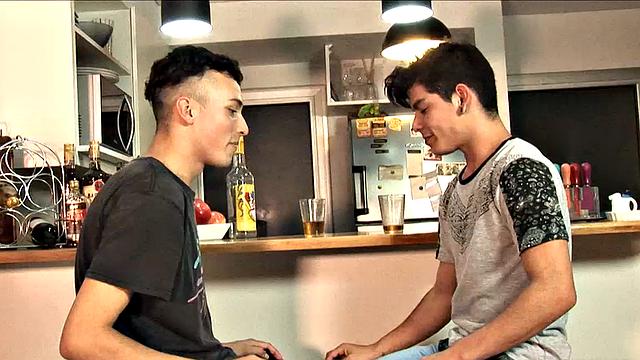 While enjoying their drinks, these two slim and young Latinos are quick to start making out, and in no time Adrian has his lips wrapped around Dylan's big uncut cock.