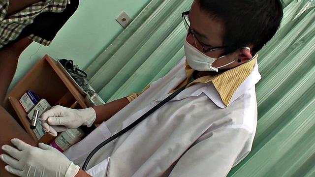 Asian doctor fingering patient before fucking his ass