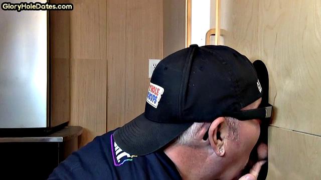 Bottom DILF gives head in gloryhole blowjob