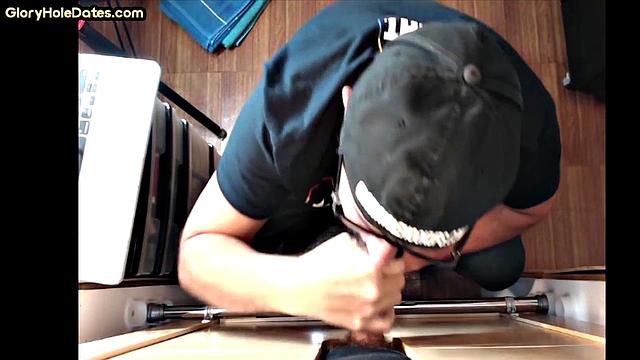 Bottom DILF gives head in gloryhole blowjob