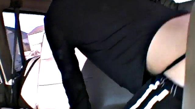 Petite teen stripping off in the back of a car