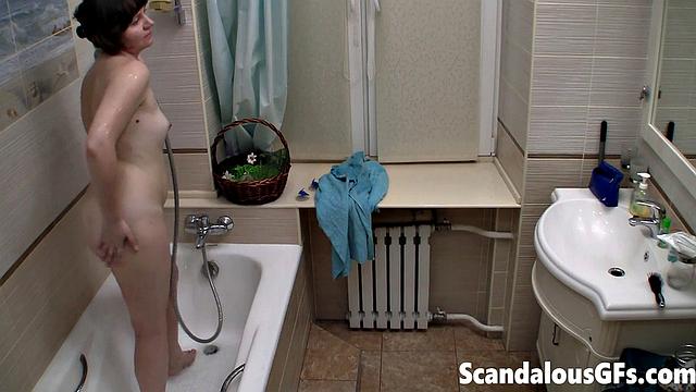 Solo teen showers and masturbates