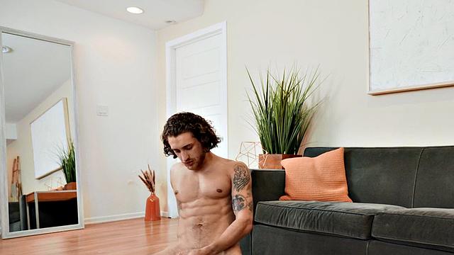 Inked amateur jock solo wanking his loaded cock