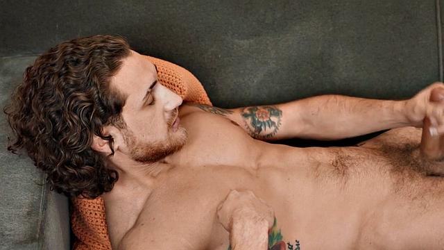 Inked amateur jock solo wanking his loaded cock