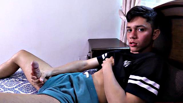 When we look in on cute little Damian kicked back on a bed and working up a boner. He slides his shorts down and starts fingering his hole, for added stimulation. Once naked, the boy is all over that bed, jerking off and finger fucking himself.