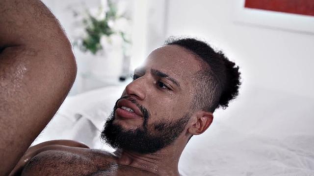 Muscled ebony barebacked by his man