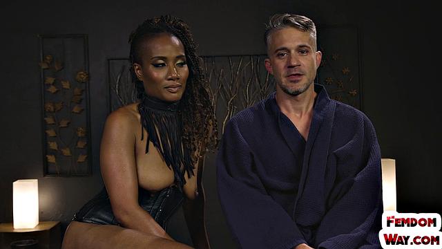 A kinky ebony femina tease and whip her male slave while wearing latex and showing off her feet