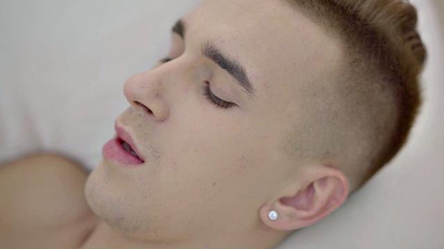 Thin twink shows off body and wanks before cumming