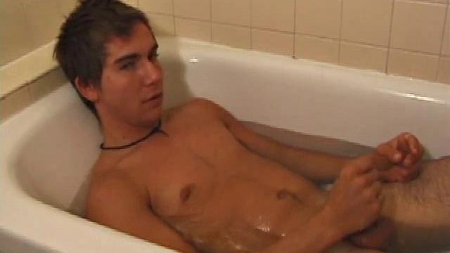 Brock is spending some down time in the bathtub reading a magazine and stroking his cock. After edging himself a few times, it doesn't take long to spew a warm load of cum onto his face.