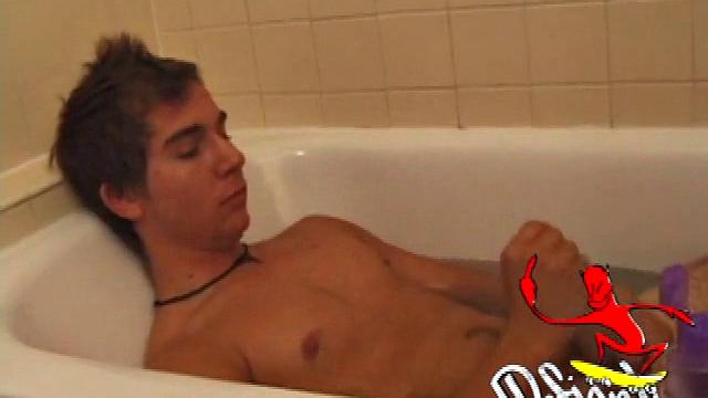 Brock is spending some down time in the bathtub reading a magazine and stroking his cock. After edging himself a few times, it doesn't take long to spew a warm load of cum onto his face.