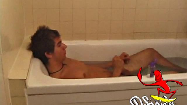 Brock is spending some down time in the bathtub reading a magazine and stroking his cock. After edging himself a few times, it doesn't take long to spew a warm load of cum onto his face.