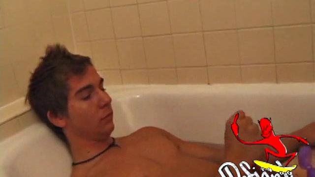 Brock is spending some down time in the bathtub reading a magazine and stroking his cock. After edging himself a few times, it doesn't take long to spew a warm load of cum onto his face.